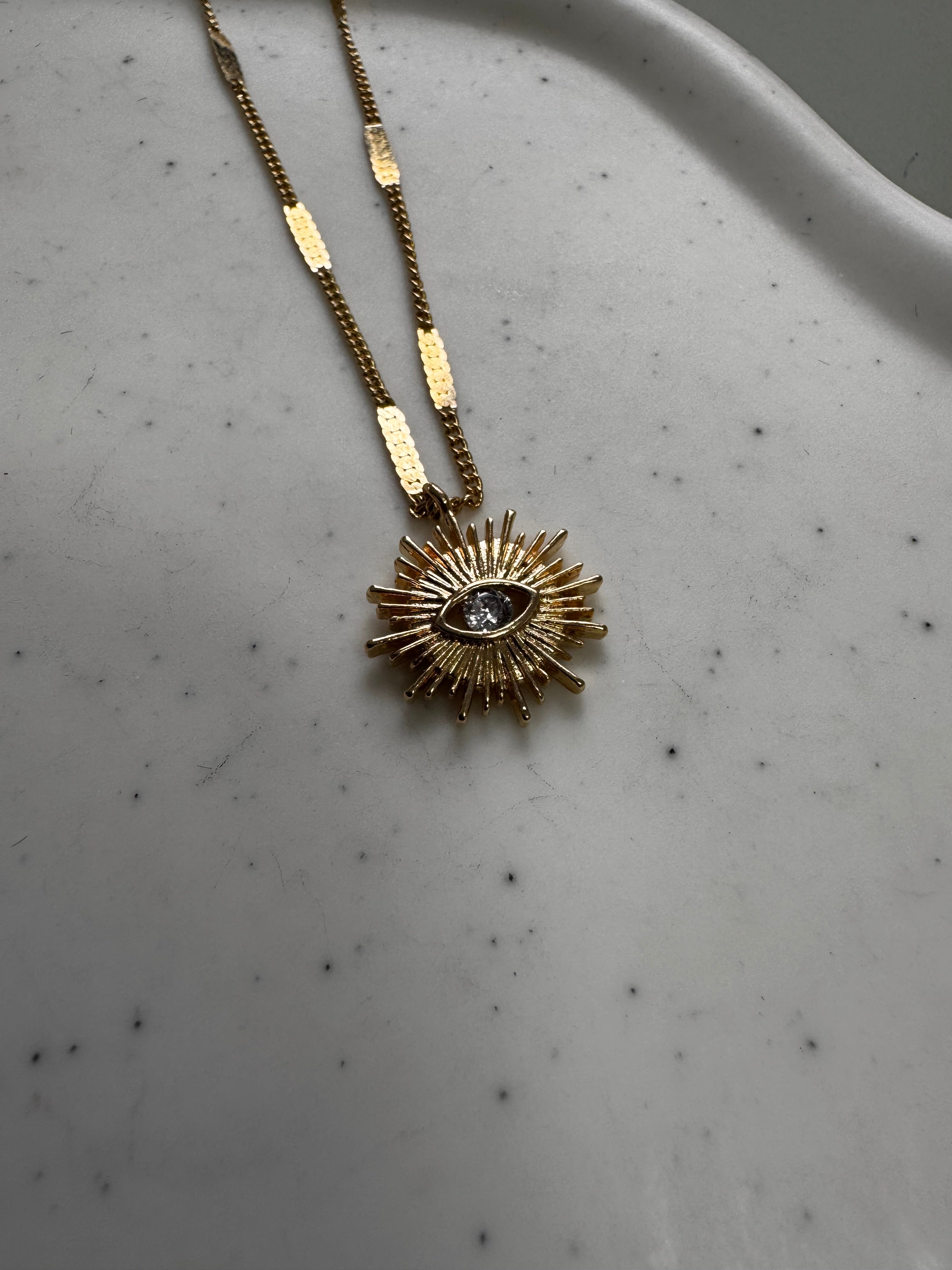Golden Sun Eye Necklace.