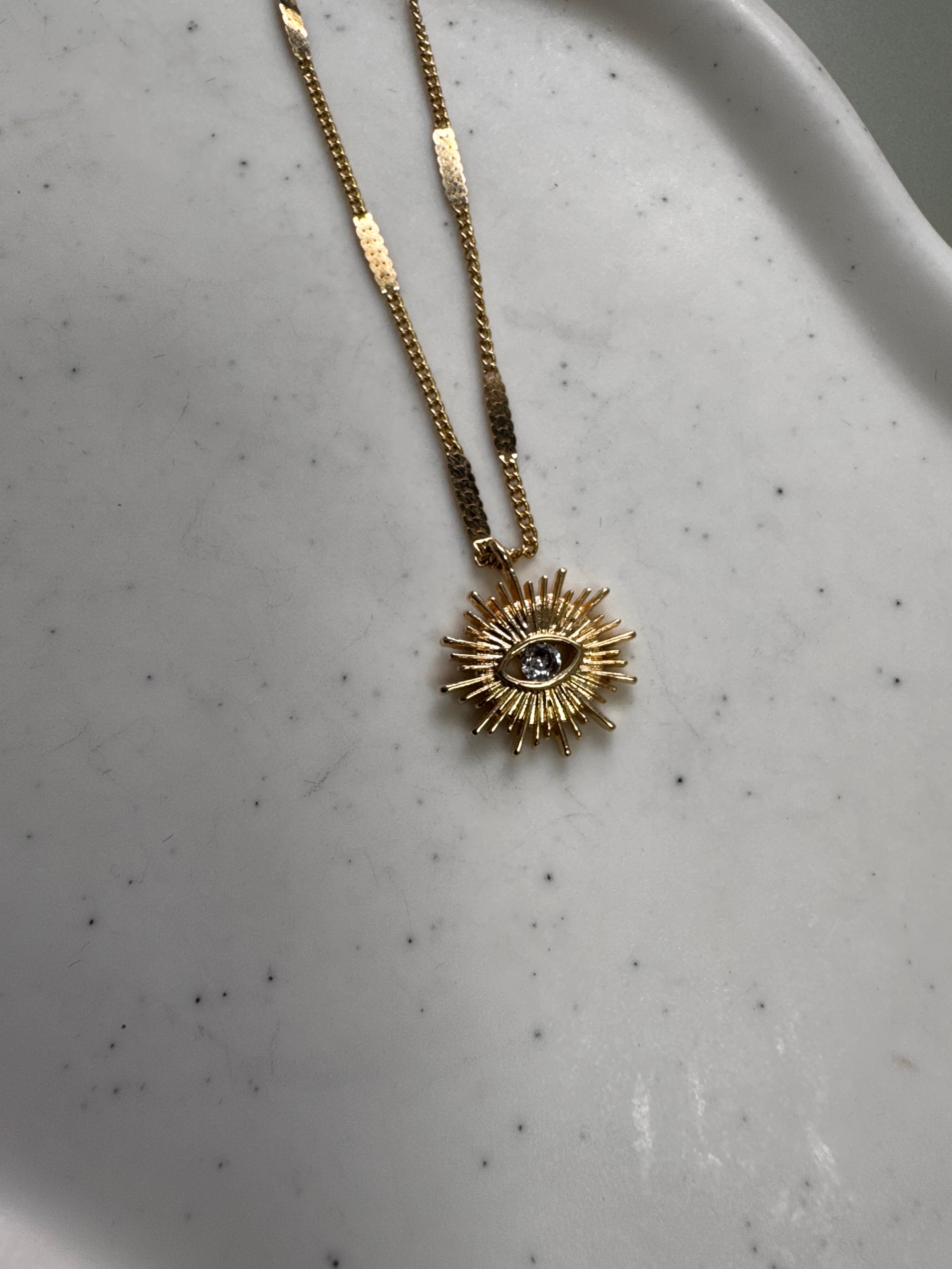 Golden Sun Eye Necklace.
