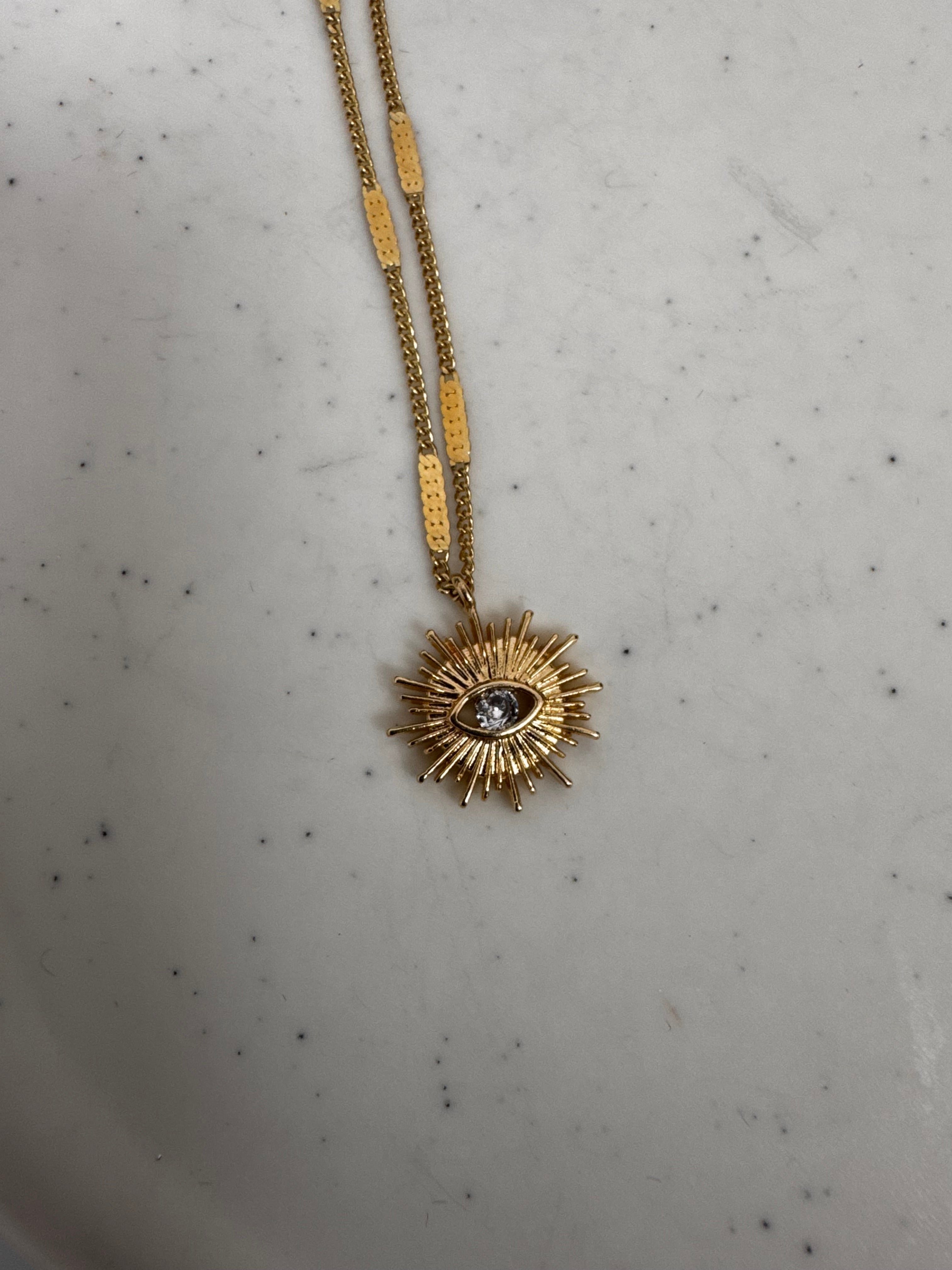 Golden Sun Eye Necklace.