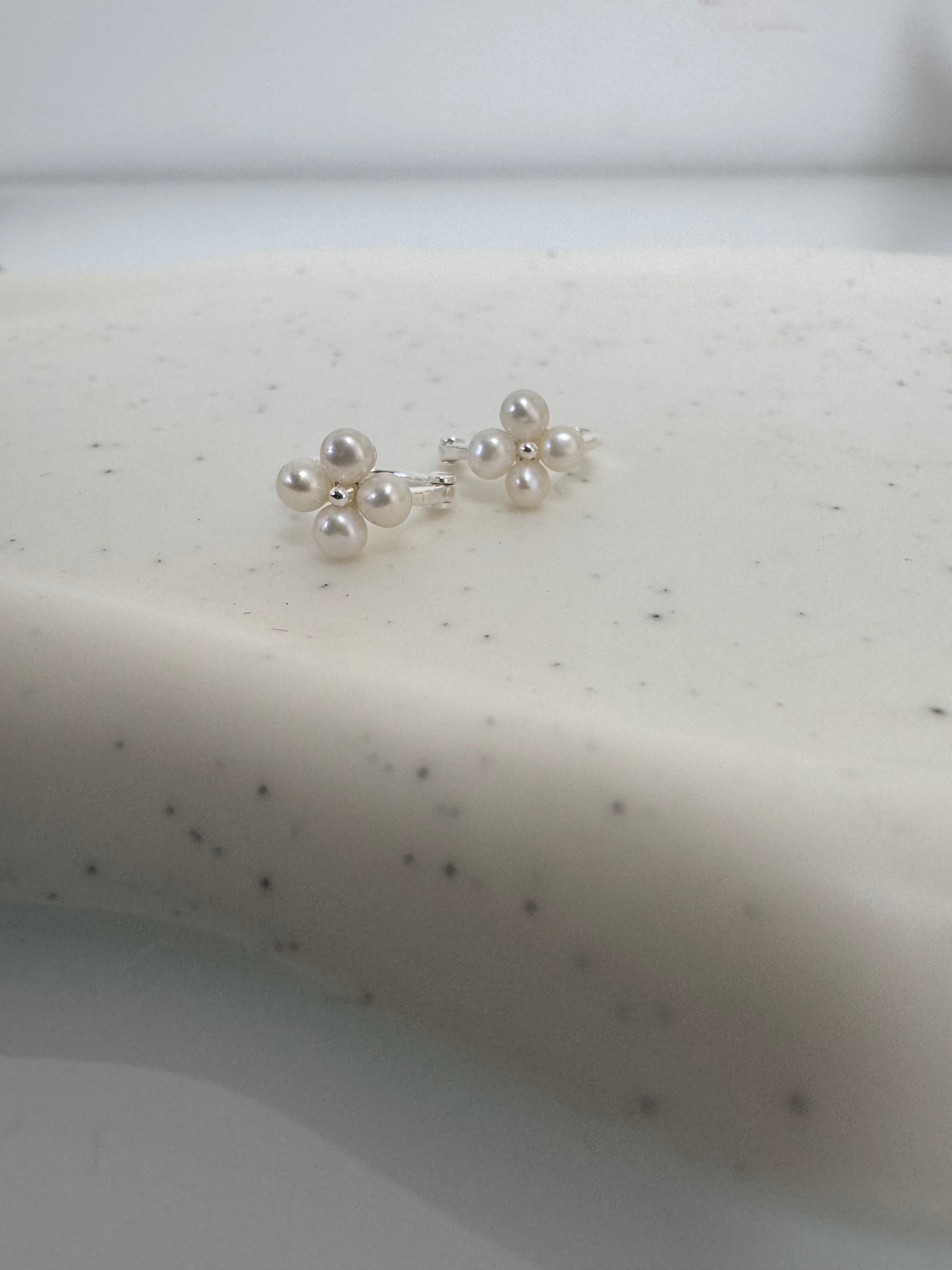 Pearl flower earrings.