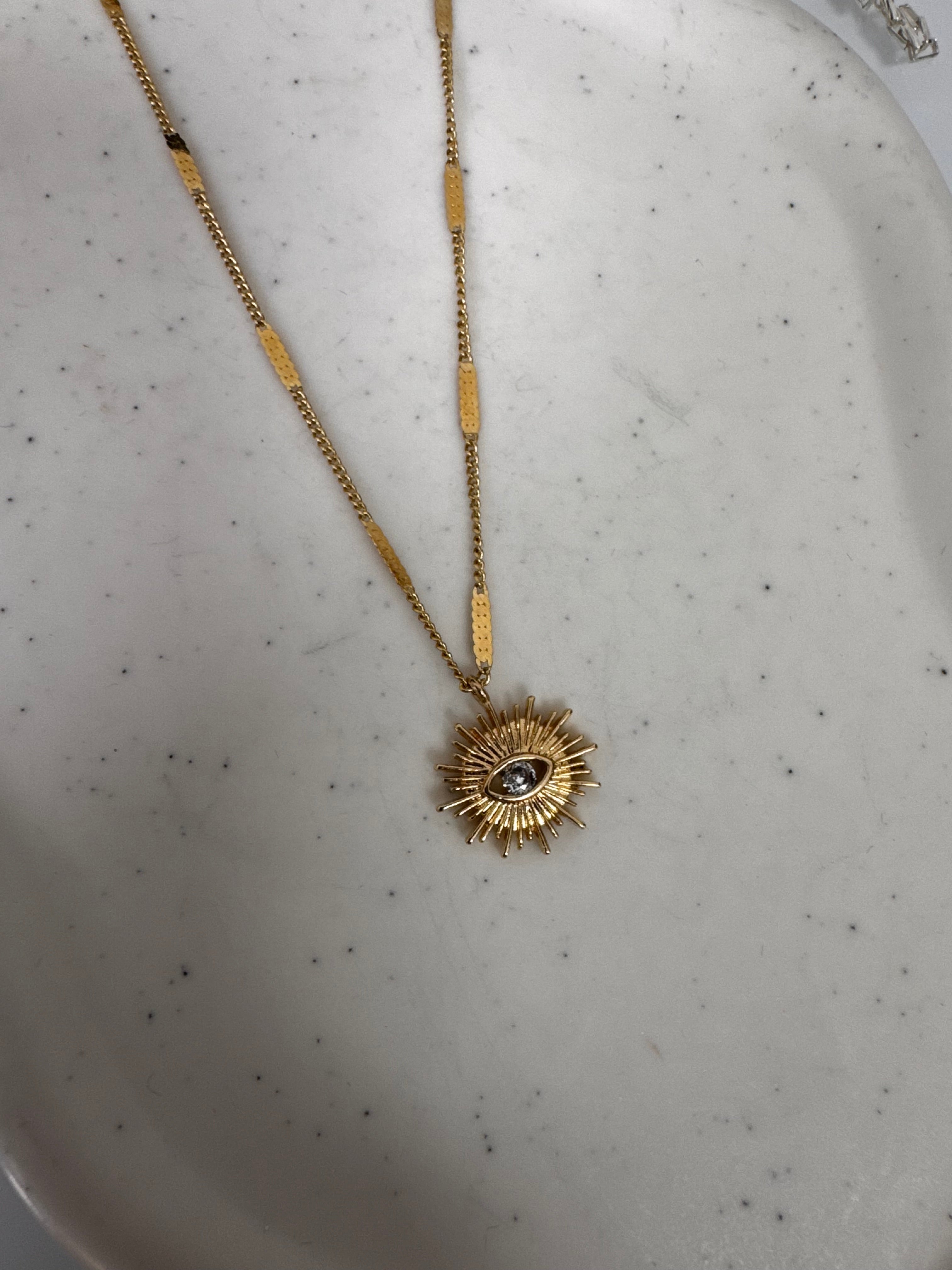 Golden Sun Eye Necklace.