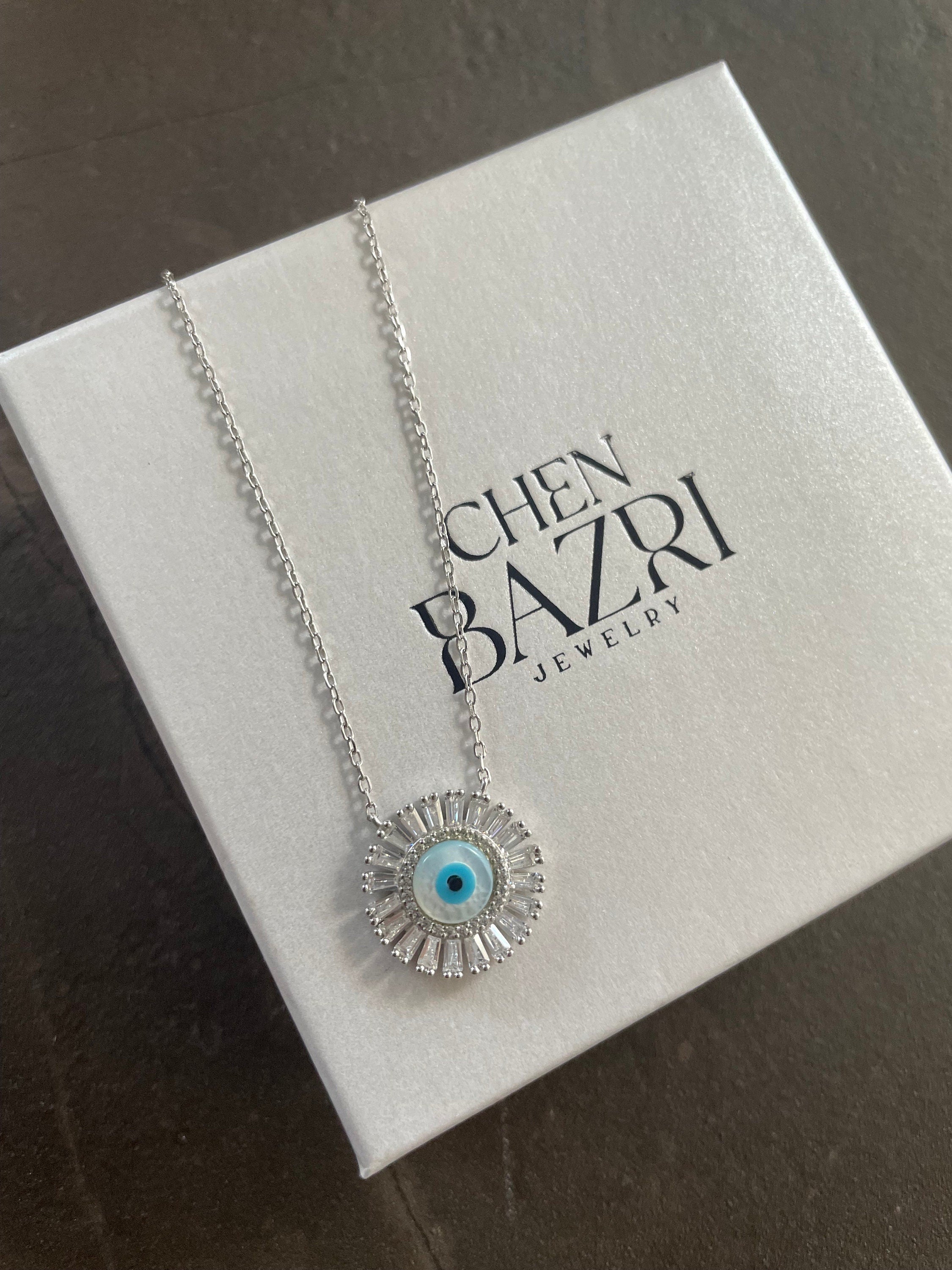 Sun necklace with an eye