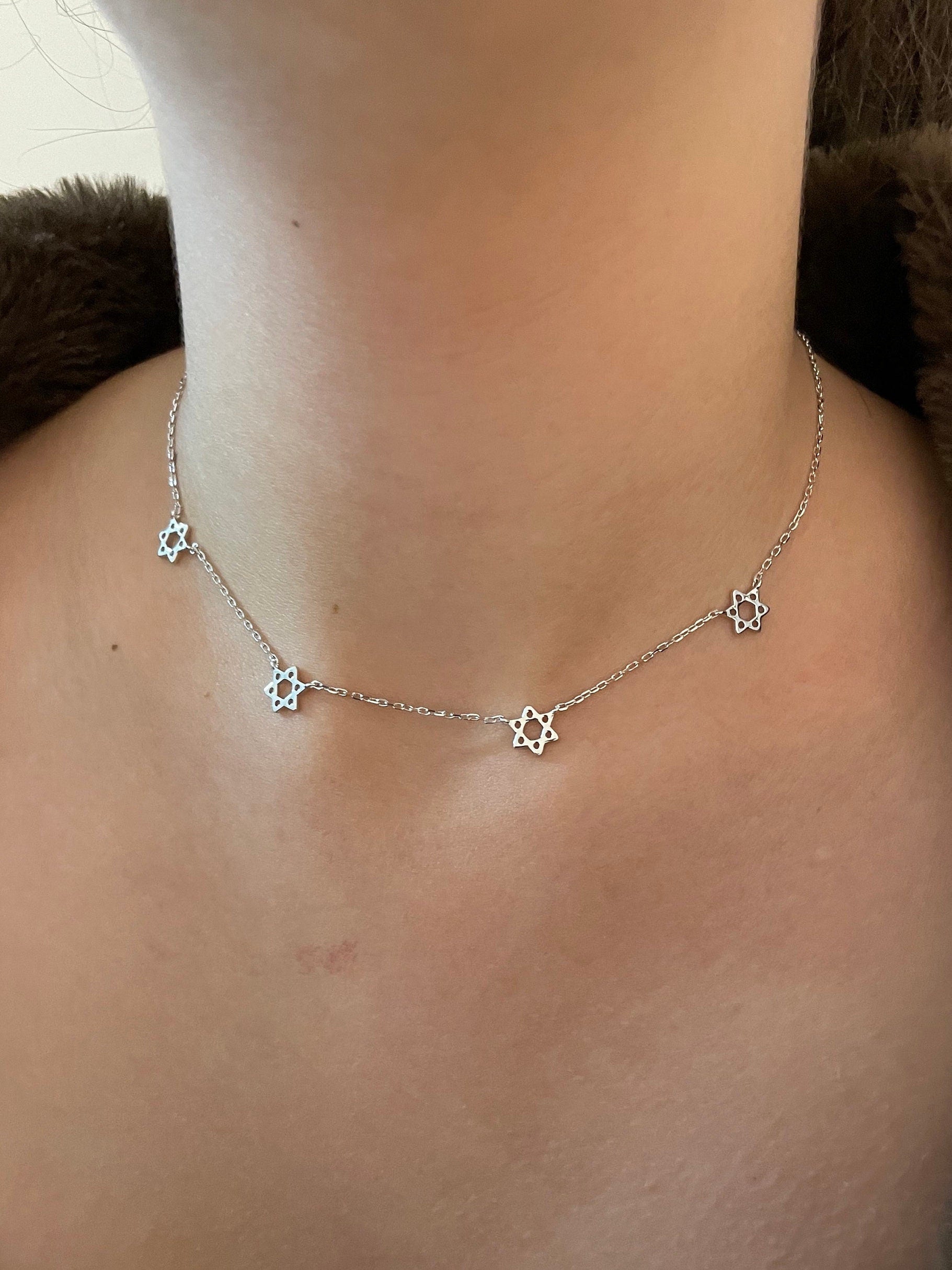 Necklace of 4 Magn David